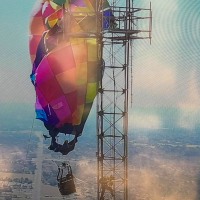 Rescue mission after a hot air balloon basket carrying two occupants struck a cell phone tower at an estimated height of 920 feet in north Gregg County.