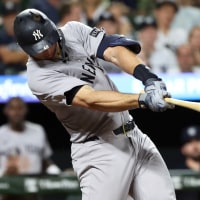 Sep 18, 2025; Baltimore, Maryland, USA; New York Yankees first baseman Paul Goldschmidt (48) hits an RBI single during the seventh inning against the Baltimore Orioles at Oriole Park at Camden Yards. Mandatory Credit: Daniel Kucin Jr.-Imagn Images