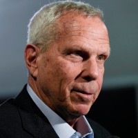 Jan 9, 2020; East Rutherford, New Jersey, USA;  New York Giants co-owner Steve Tisch talks to reporters after the press conference introducing new head coach Joe Judge (not pictured) at MetLife Stadium. Mandatory Credit: Danielle Parhizkaran-Imagn Images