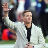 Feb 8, 2026; Santa Clara, CA, USA; New Orleans Saints former player Drew Brees stands on the field before the start of the second quarter in Super Bowl LX between the New England Patriots and the Seattle Seahawks at Levi's Stadium. Mandatory Credit: Darren Yamashita-Imagn Images