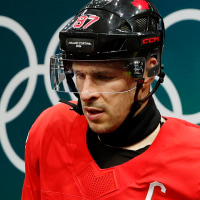 Feb 18, 2026; Milan, Italy; Sidney Crosby of Canada walks out to the ice before a men's ice hockey quarterfinal during the Milano Cortina 2026 Olympic Winter Games at Milano Santagiulia Ice Hockey Arena. Mandatory Credit: Geoff Burke-Imagn Images
