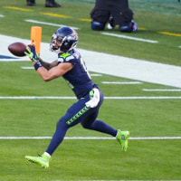 SANTA CLARA, CALIFORNIA - FEBRUARY 8: Jaxon Smith-Njigba #11 of the Seattle Seahawks  makes a catch during the NFL Super Bowl LX football game against the New England Patriots at Levi's Stadium on February 8, 2026 in Santa Clara, California. (Photo by Perry Knotts/Getty Images)