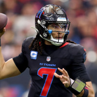 HOUSTON, TEXAS - JANUARY 04: C.J. Stroud #7 of the Houston Texans throws a pass in the first half against the Indianapolis Colts at NRG Stadium on January 04, 2026 in Houston, Texas. (Photo by Tim Warner/Getty Images)