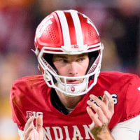 MIAMI GARDENS, FL - JANUARY 19: QB Fernando Mendoza #15 of the Indiana Hoosiers prepares to take the snap of the ball at the line of scrimmage during the Indiana Hoosiers versus the Miami Hurricanes College Football Playoff National Championship Game Presented by AT&T on January 19, 2026, at Hard Rock Stadium in Miami Gardens, FL. (Photo by Doug Murray/Icon Sportswire via Getty Images)