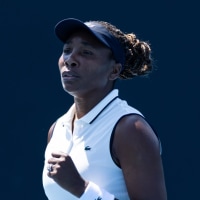 Jan 20, 2026; Melbourne, Victoria, Australia; Venus Williams of United States and Ekaterina Alexandrova in action against Emiliana Arango of Colombia and Elsa Jacquemot of France in the first round of the womens doubles at the Australian Open at Melbourne Park. Mandatory Credit: Mike Frey-Imagn Images
