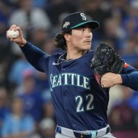 Oct 20, 2025; Toronto, Ontario, CAN; Seattle Mariners pitcher Bryan Woo (22) throws in the fifth inning against the Toronto Blue Jays during game seven of the ALCS round for the 2025 MLB playoffs at Rogers Centre. Mandatory Credit: Nick Turchiaro-Imagn Images