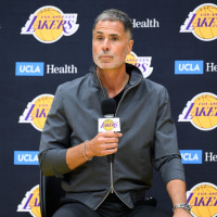Sep 25, 2025; El Segundo, CA, USA; Los Angeles Lakers general manager Rob Pelinka, left, speaks during a press conference to preview the 2025-26 season at UCLA Health Training Center. Mandatory Credit: William Liang-Imagn Images