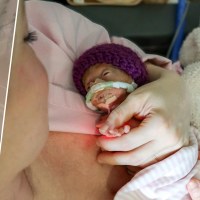A video of Taylor Plemmons finally holding her NICU baby went viral.