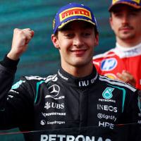 Race winner George Russell of Great Britain and Mercedes AMG Petronas F1 Team arrives on the podium during the F1 Grand Prix of Australia at Albert Park Grand Prix Circuit on Sunday.