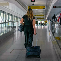 A passenger walks at the ariport.