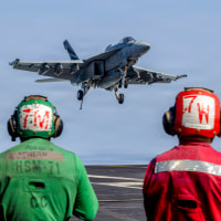 An F/A-18E Super Hornet, attached to Strike Fighter Squadron (VFA) 151, preparing to make an arrested landing on the flight deck of Nimitz-class aircraft carrier USS Abraham Lincoln