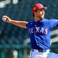 Pitcher Carter Baumler #68 of the Texas Rangers throws during the sixth inning of a World Baseball Classic 