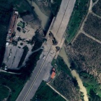 Satellite imagery of Qasmiyeh Highway Bridge, pictured left on March 17, and on Tuesday, right, following an Israeli airstrike.