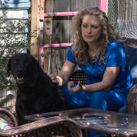 Jillian Frank and her dog, Gable. Gable and another of the family's dogs, Murray, have been sickened by what police said are methamphetamine-laced hot dogs being placed in the family's yard, and no one knows who's responsible.