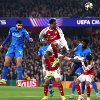 LONDON, ENGLAND - MARCH 17: Gabriel of Arsenal jumps for a header during the UEFA Champions League 2025/26 Round of 16 Second Leg match between Arsenal FC and Bayer 04 Leverkusen at Arsenal Stadium on March 17, 2026 in London, England. (Photo by Warren Little/Getty Images)