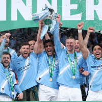 LONDON, ENGLAND - MARCH 22: Rodri and Erling Haaland of Manchester City lift the Carabao Cup trophy after the team's victory in the Carabao Cup Final match Arsenal and between Manchester City at Wembley Stadium on March 22, 2026 in London, England. (Photo by Julian Finney/Getty Images)