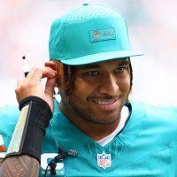 MIAMI GARDENS, FLORIDA - DECEMBER 21: Tua Tagovailoa #1 of the Miami Dolphins looks on during the second half of the game against the Cincinnati Bengals at Hard Rock Stadium on December 21, 2025 in Miami Gardens, Florida. (Photo by Megan Briggs/Getty Images)