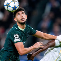 Vinicius Junior of Real Madrid CF and Matheus Nunes of Manchester City FC during the UEFA Champions League match, between Real Madrid CF and Manchester City, Santiago Bernabeu Stadium on December 10 2025 in Madrid, Spain. (Photo by Pressinphoto/Icon Sport via Getty Images)