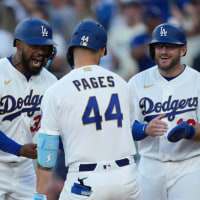 Mar 26, 2026; Los Angeles, California, USA; Los Angeles Dodgers outfielder Andy Pages (44) celebrates with outfielder Teoscar Hernandez (37) and infielder Max Muncy (13) at home plate after hitting a three run home run against Arizona Diamondbacks starting pitcher Zac Gallen (not pictured) during the fifth inning at Dodger Stadium. Mandatory Credit: Kirby Lee-Imagn Images
