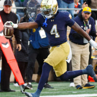 Notre Dame running back Jeremiyah Love (4) runs the ball into the end zone for a touchdown in the first half of a NCAA football game against Syracuse at Notre Dame Stadium on Saturday, Nov. 22, 2025, in South Bend.
