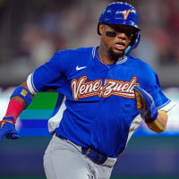 MIAMI, FL - MARCH 16:  Ronald Acuña Jr. #21 of Team Venezuela advances to third base during the 2026 World Baseball Classic WBC game presented by Capital One between Team Venezuela and Team Italy at loanDepot park on Monday, March 16, 2026 in Miami, Florida. (Photo by Daniel Shirey/WBCI/MLB Photos via Getty Images)