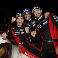 #7: Porsche Penske Motorsport, Porsche 963, GTP: Felipe Nasr, Julien Andlauer, Laurin Heinrich celebrate in victory lane
