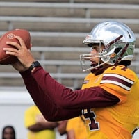 Bethune-Cookman QB Dominiq Ponder takes a snap during the Wildcats' spring game Saturday, April 22, 2023, at Daytona Stadium. Bethune 10