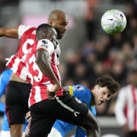 Brentford's Michael Kayode scores their side's first goal during the Premier League match at the Gtech Community Stadium, London. Picture date: Monday March 16, 2026. (Photo by Nick Potts/PA Images via Getty Images)