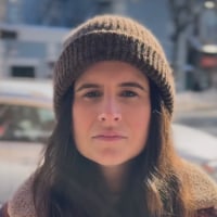 Kate Bolger in videos on The Village Confectionery's social media pages.