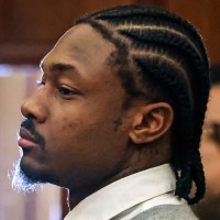 Stefon Diggs stands in a courtroom