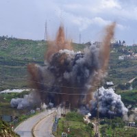 Israeli warplanes struck the strategic Qasmiyeh Bridge over the Litani River in southern Lebanon.