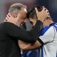 Pellegrino Matarazzo embraces Duje Caleta-Car with both hands.