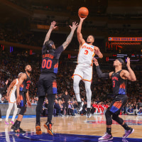 CJ McCollum of the Atlanta Hawks drives to the basket during the game against the New York Knicks