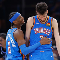 Apr 5, 2026; Oklahoma City, Oklahoma, USA; Oklahoma City Thunder guard Shai Gilgeous-Alexander (2) and center Chet Holmgren (7) laugh after a play against the Utah Jazz during the second half at Paycom Center. Mandatory Credit: Alonzo Adams-Imagn Images