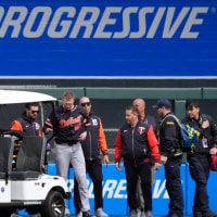 Apr 9, 2026; Minneapolis, Minnesota, USA; Detroit Tigers center fielder Parker Meadows (22) enters a cart after he collided with left fielder Riley Greene (31) on a fly ball hit by Minnesota Twins designated hitter Josh Bell (not pictured) in the eighth inning at Target Field. Meadows left the game. Mandatory Credit: Bruce Kluckhohn-Imagn Images