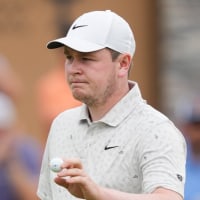 Apr 3, 2026; San Antonio, Texas, USA; Robert MacIntyre acknowledges the crowd after a putt on the 16th green during the second round of the Valero Texas Open golf tournament. Mandatory Credit: Daniel Dunn-Imagn Images