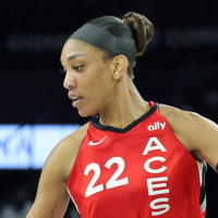 LAS VEGAS, NEVADA - AUGUST 17: Paige Bueckers #5 of the Dallas Wings drives against A'ja Wilson #22 of the Las Vegas Aces in the third quarter of their game at Michelob ULTRA Arena on August 17, 2025 in Las Vegas, Nevada. The Aces defeated the Wings 106-87. NOTE TO USER: User expressly acknowledges and agrees that, by downloading and or using this photograph, User is consenting to the terms and conditions of the Getty Images License Agreement. (Photo by Ethan Miller/Getty Images)
