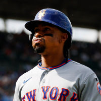 Apr 17, 2026; Chicago, Illinois, USA; New York Mets shortstop Francisco Lindor (12) walks back to the dugout after flying out against the Chicago Cubs during the sixth inning at Wrigley Field. Mandatory Credit: Kamil Krzaczynski-Imagn Images