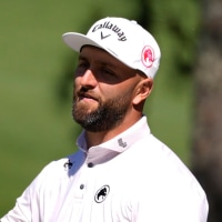 Apr 9, 2026; Augusta, Georgia, USA; Jon Rahm reacts after a putt on the 10th green during the first round of the Masters Tournament at Augusta National Golf Club. Mandatory Credit: Katie Goodale-Imagn Images