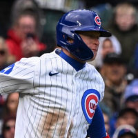 Apr 19, 2026; Chicago, Illinois, USA; Chicago Cubs center fielder Pete Crow-Armstrong (4) jumps while waiting to head home after hitting a triple during the third inning at Wrigley Field. Mandatory Credit: Matt Marton-Imagn Images