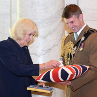 Queen Camilla gifts the New York Public Library a specially-made replica of Roo produced by Merrythought, the same manufacturer that produced Christopher Robin's original dolls in the 1920s.