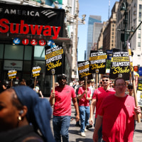 Long Island Rail Road (LIRR) workers picket in front of Penn Station in New York City