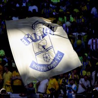 A flag is seen with the logo / badge of Southampton FC.