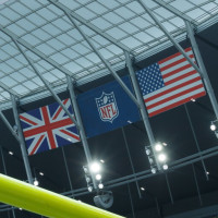 London, United Kingdom - October 6: The flags of Great Britain and the US aside the NFL Logo during the NFL match between New York Jets and Minnesota Vikings at Tottenham Hotspur Stadium on October 6, 2024 in London, England. (Photo by Mario Hommes/DeFodi Images via Getty Images)