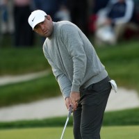 May 14, 2026; Newtown Square, Pennsylvania, USA; Scottie Scheffler putts on the 18th green during the first round of the PGA Championship golf tournament at Aronimink Golf Club. Mandatory Credit: James Lang-Imagn Images