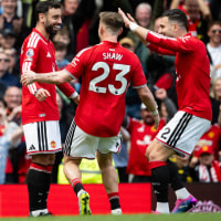 MANCHESTER, ENGLAND - MAY 17: Bruno Fernandes, Luke Shaw and Diogo Dalot of Manchester United celebrate after Bryan Mbeumo of Manchester United (not pictured) scores his teams third goal during the Premier League match between Manchester United and Nottingham Forest at Old Trafford on May 17, 2026 in Manchester, England. (Photo by Ash Donelon/Manchester United via Getty Images)