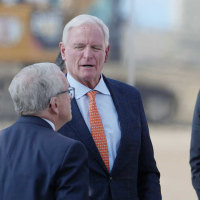 Ohio Governor Mike DeWine chats with Jimmy Haslam and NFL Commissioner Roger Goodell before they take the stage during the Cleveland Browns groundbreaking ceremony for the new Huntington Bank Field in Brook Park, Ohio on April 30, 2026.