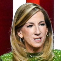 Cathy Engelbert speaks at a podium, behind her in large white text reads "Draft 2026"