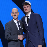 Jun 25, 2025; Brooklyn, NY, USA; Cooper Flagg poses with NBA commissioner Adam Silver after being selected as first overall by the Dallas Mavericks in the first round of the 2025 NBA Draft at Barclays Center. Mandatory Credit: Brad Penner-Imagn Images