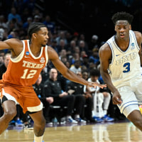 Mar 19, 2026; Portland, OR, USA; BYU Cougars forward AJ Dybantsa (3) drives against Texas Longhorns guard Tramon Mark (12) in the first half during a first round game of the men's 2026 NCAA Tournament at Moda Center. Mandatory Credit: Craig Strobeck-Imagn Images
